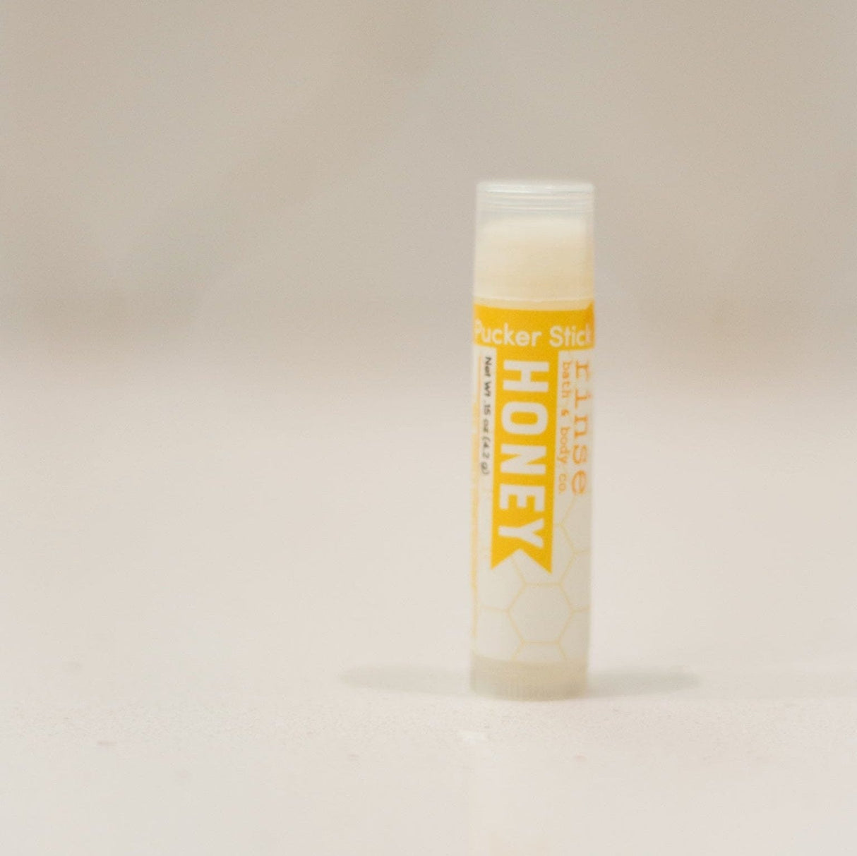 Honey natural lip balm from Rinse - nourishing lip care - detail view