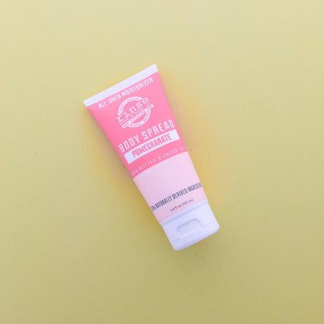 natural body lotion tube in Pomegranate by Rinse Bath & Body - detail view