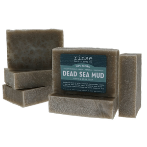 Dead Sea Mud soap bars with a 'rinse' label on a white background